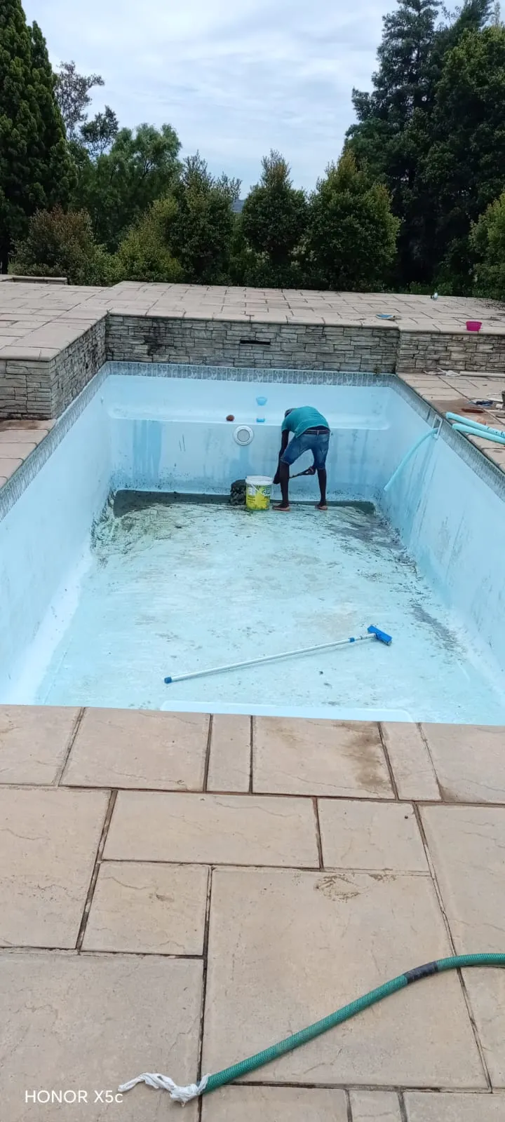 Deep cleaning of pool interior before resurfacing